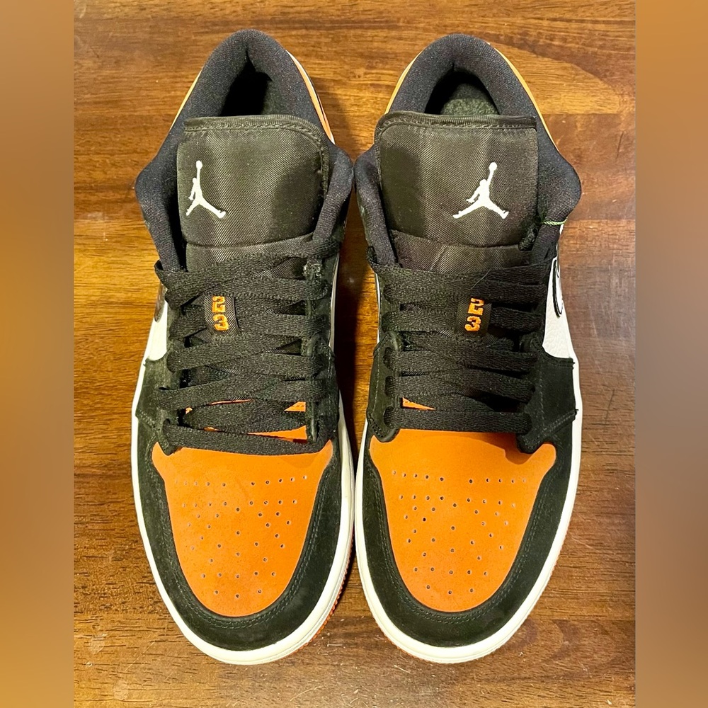 Men’s Air Jordan 1 Low, 
Size 9, Color: Black / Orange / White